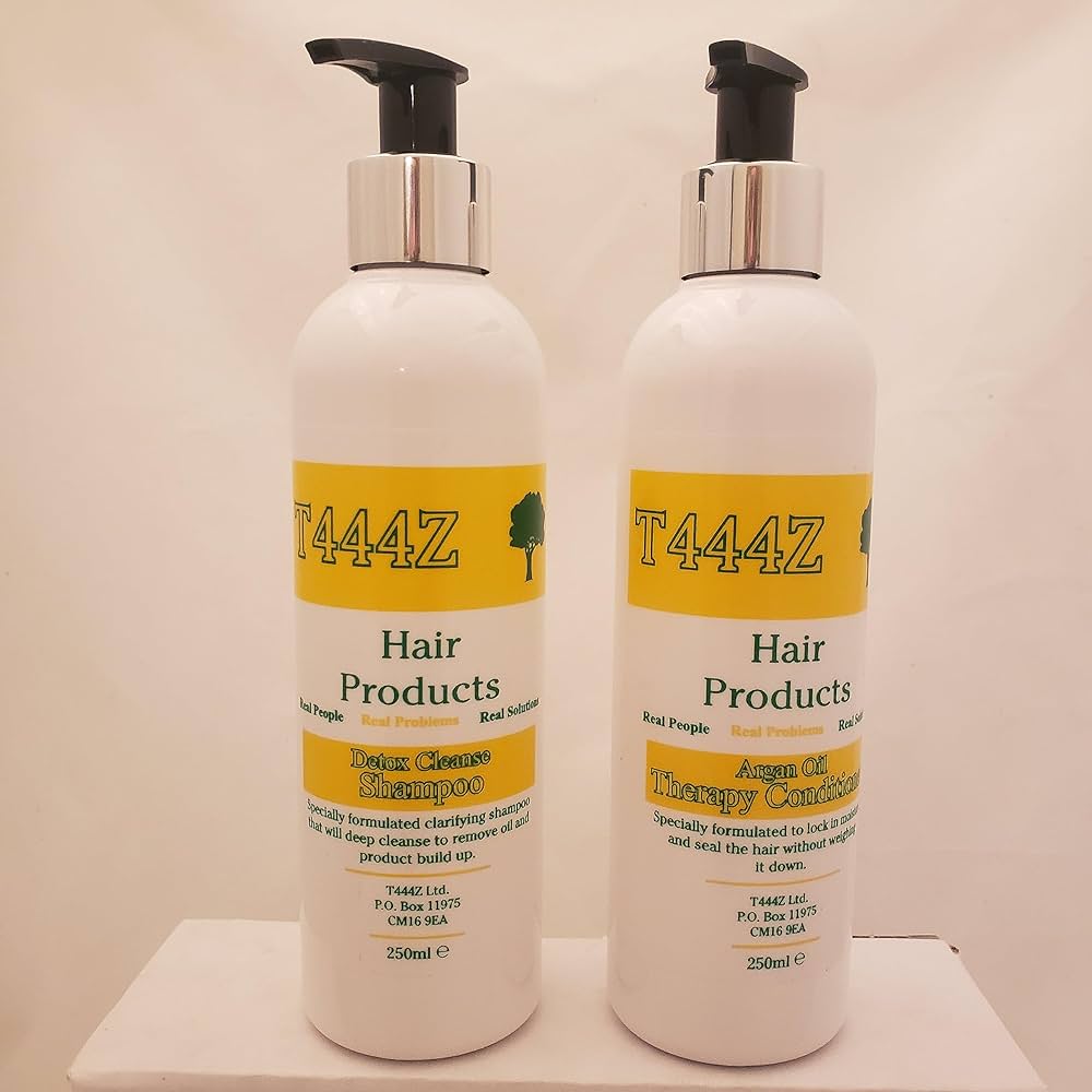 A set of two T444Z Detox Cleanse Shampoo products, featuring a black and gold packaging with bold letters. The products are specifically designed to deeply cleanse and nourish the hair, promoting healthy hair growth and overall scalp health. Perfect for all hair types, this duo is essential for anyone looking to improve the condition of their hair.
